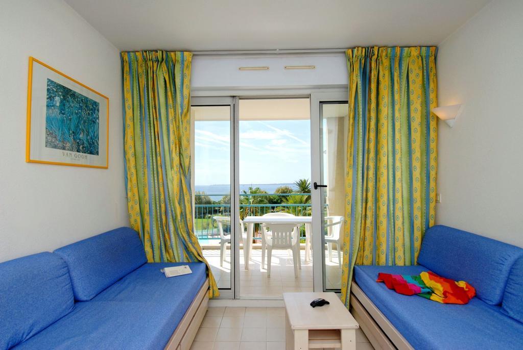 Residence Odalys Les Pins Bleus Juan-les-Pins Rum bild