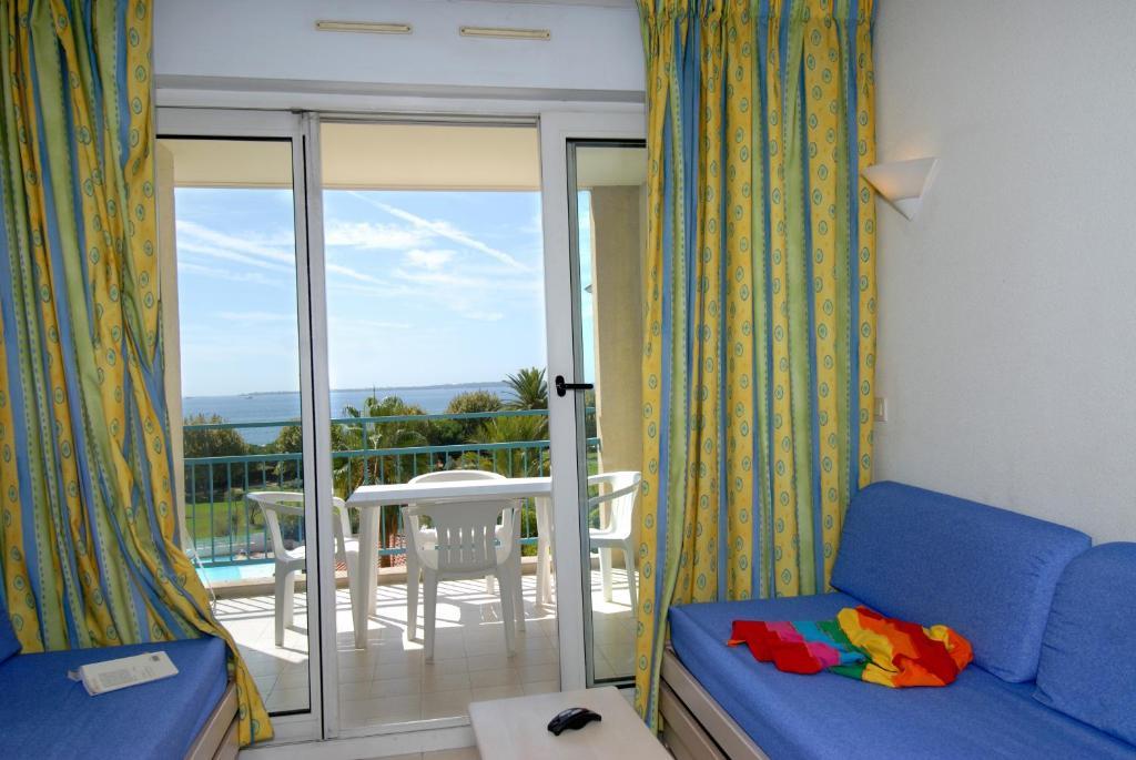 Residence Odalys Les Pins Bleus Juan-les-Pins Rum bild